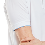 Polo piqué uni avec rayure sur le col