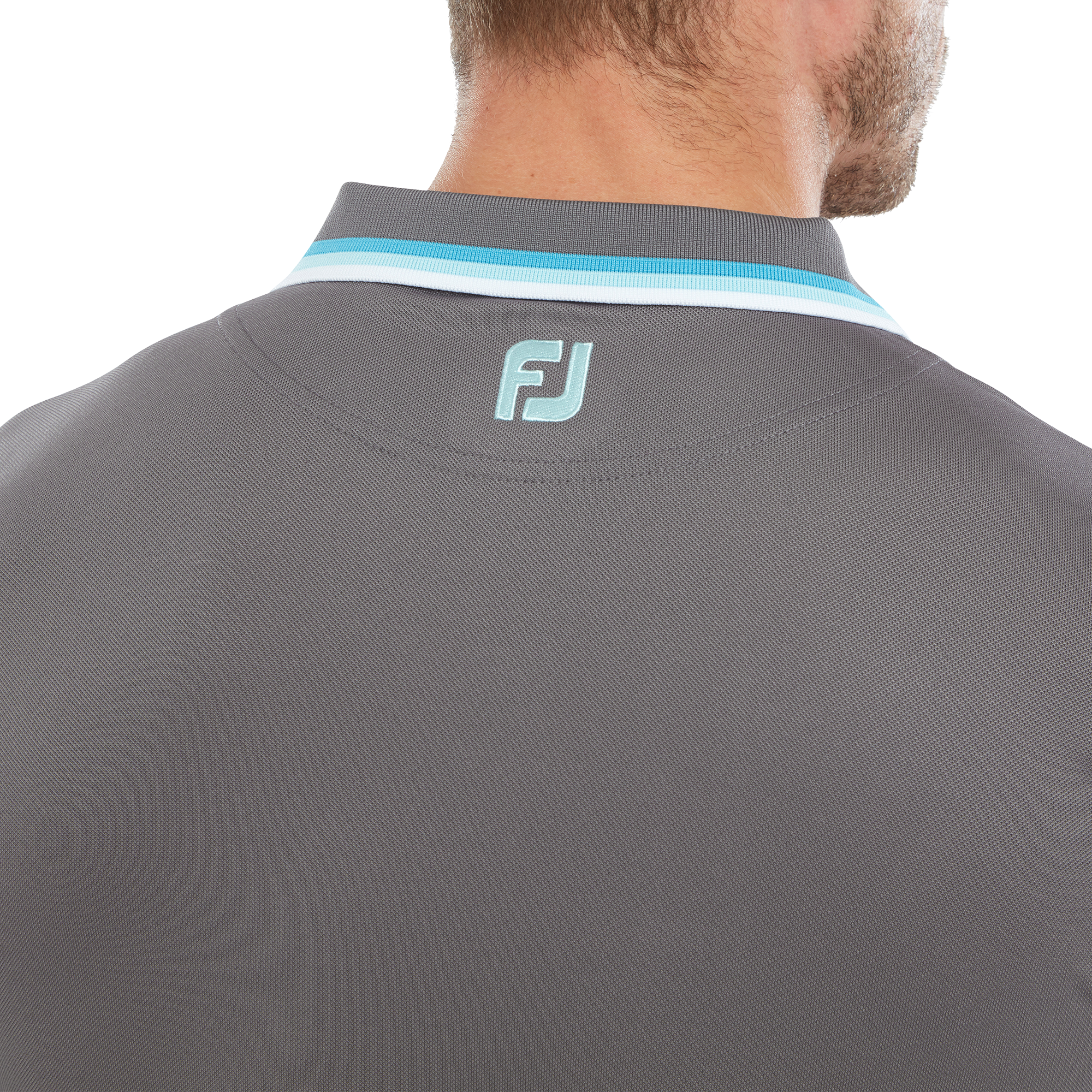 Polo uni avec d&eacute;tails sur le col et les manches