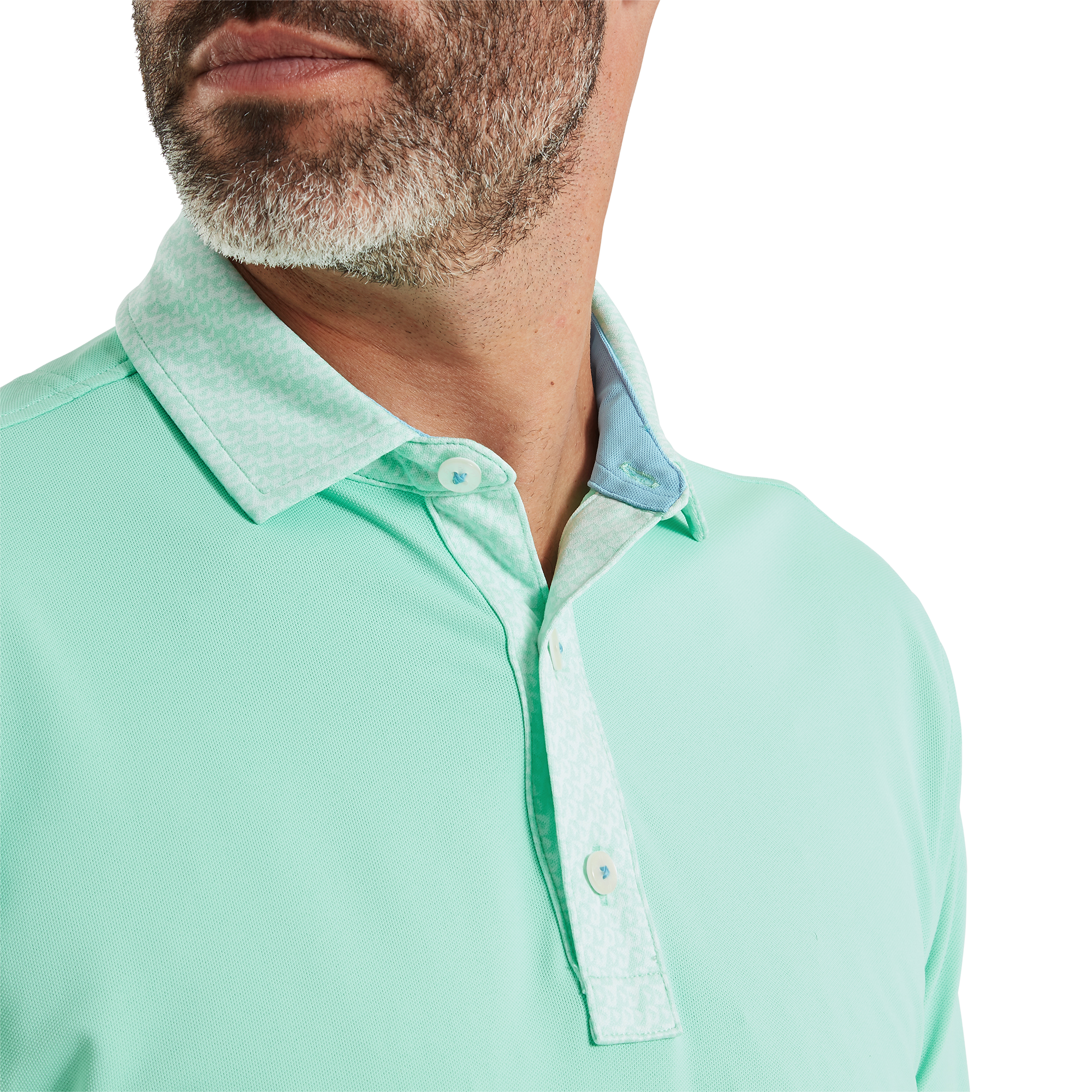 Polo piqu&eacute; aux d&eacute;tails g&eacute;om&eacute;triques