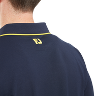 Polo piqué uni avec rayure sur le col