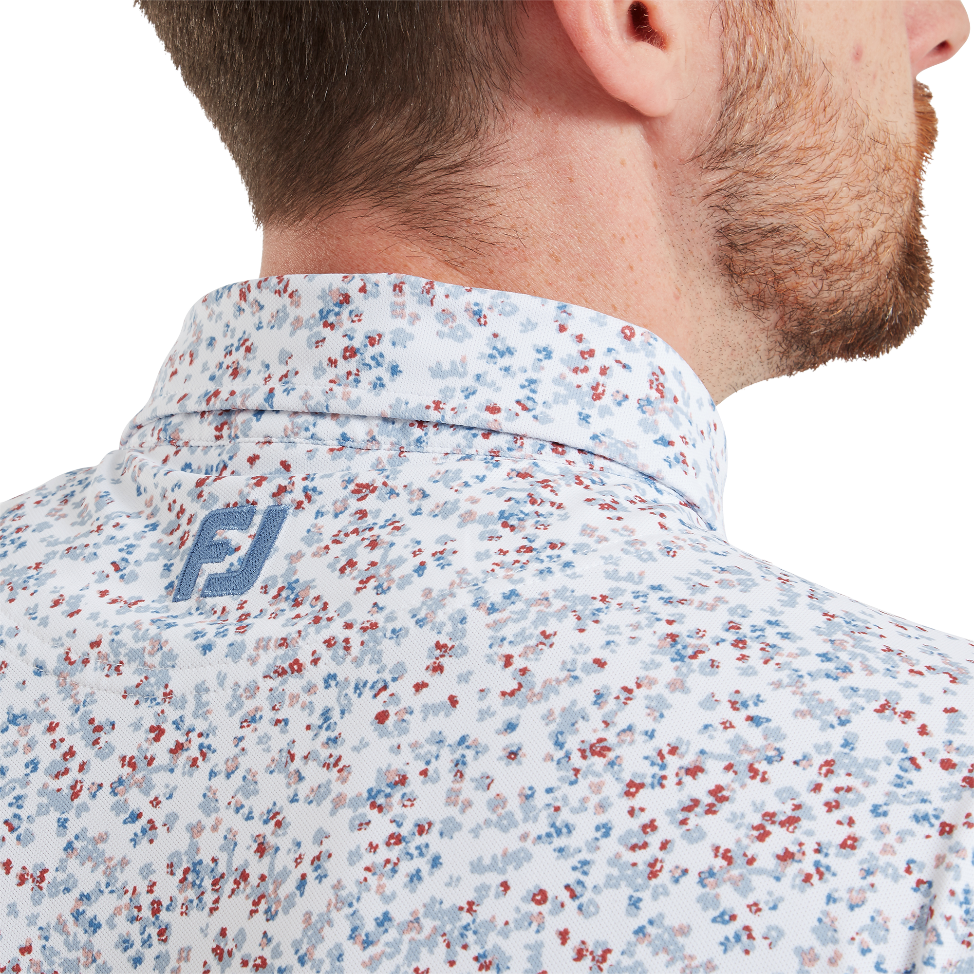 Polo piqu&eacute; imprim&eacute; floral effet aquarelle