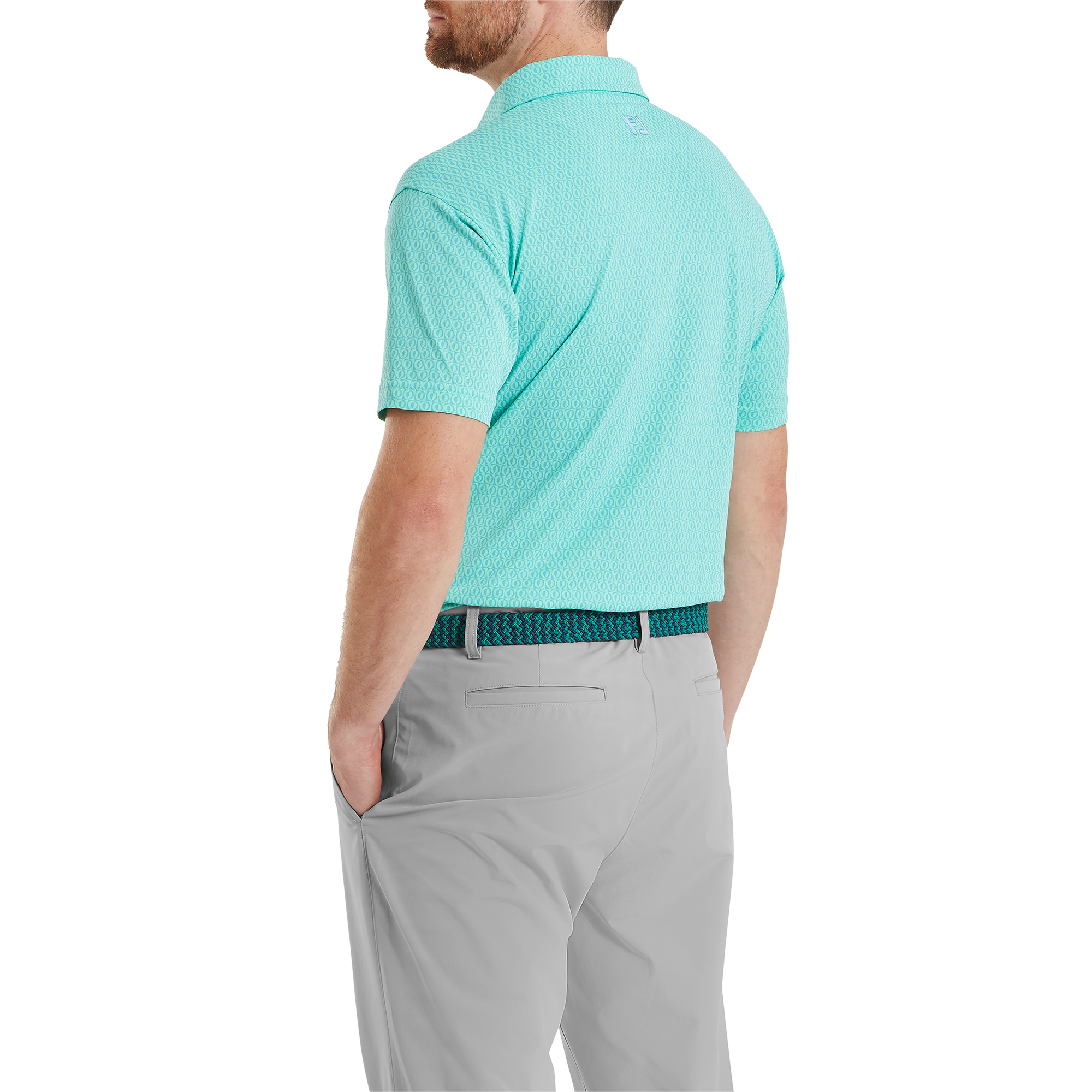 Polo piqu&eacute; &agrave; motifs g&eacute;om&eacute;triques modernistes