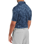 Polo en fil d'Ecosse imprimé camouflage