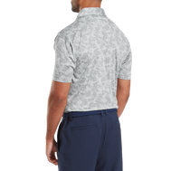 Polo en fil d'Ecosse imprimé camouflage