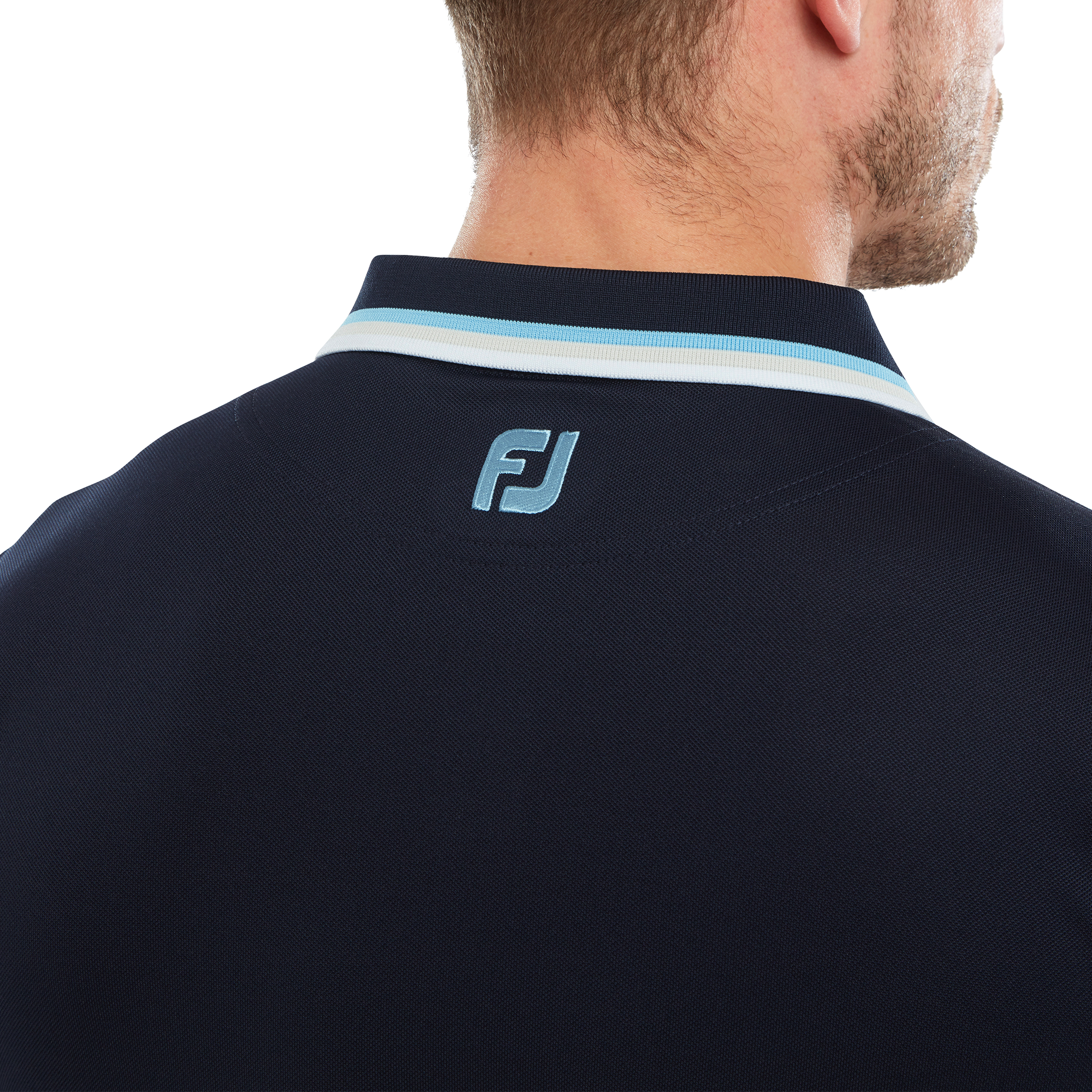 Polo uni avec d&eacute;tails sur le col et les manches