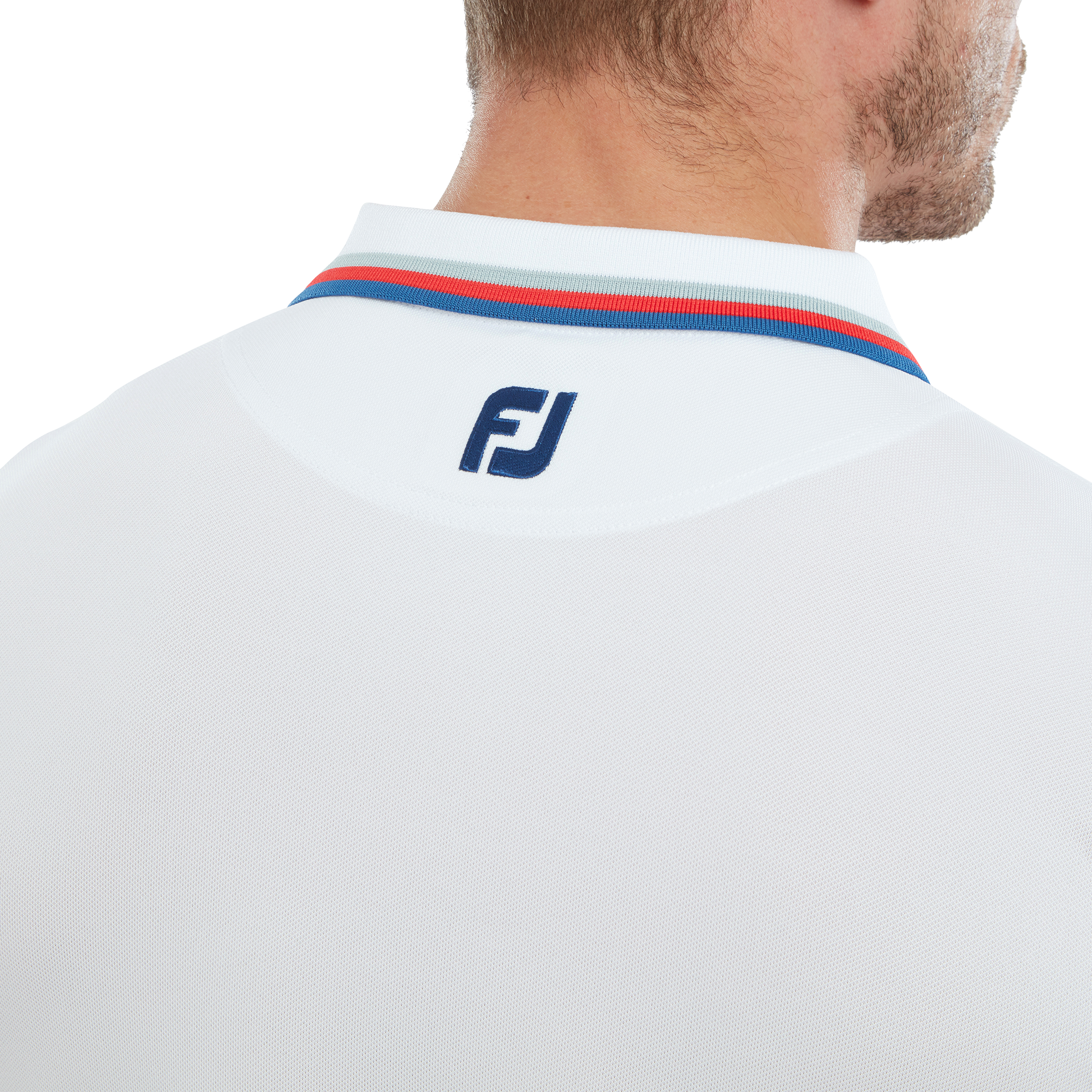 Polo uni avec d&eacute;tails sur le col et les manches