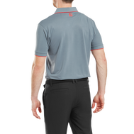 Polo piqué uni avec rayure sur le col