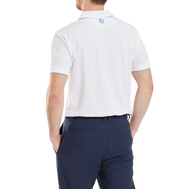 Polo piqué uni avec rayure sur le col