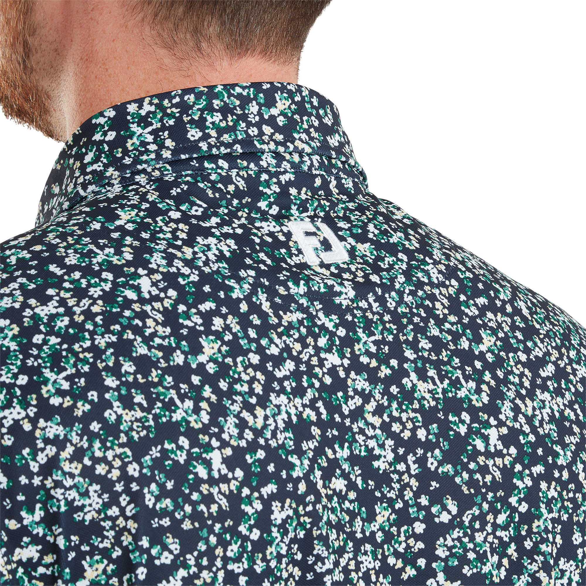 Polo piqu&eacute; imprim&eacute; floral effet aquarelle