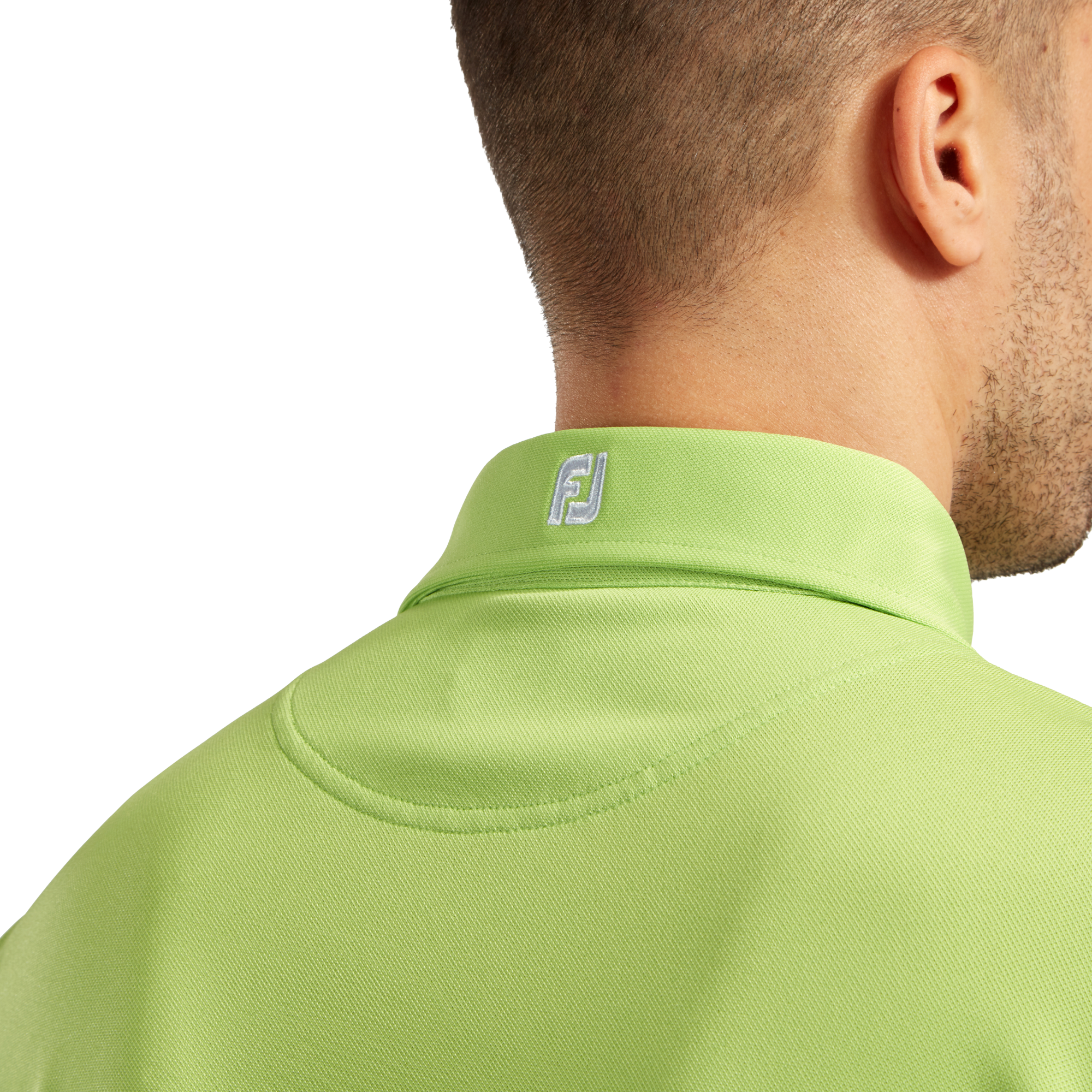 Polo Stretch Piqu&eacute; uni avec logo FJ sur col