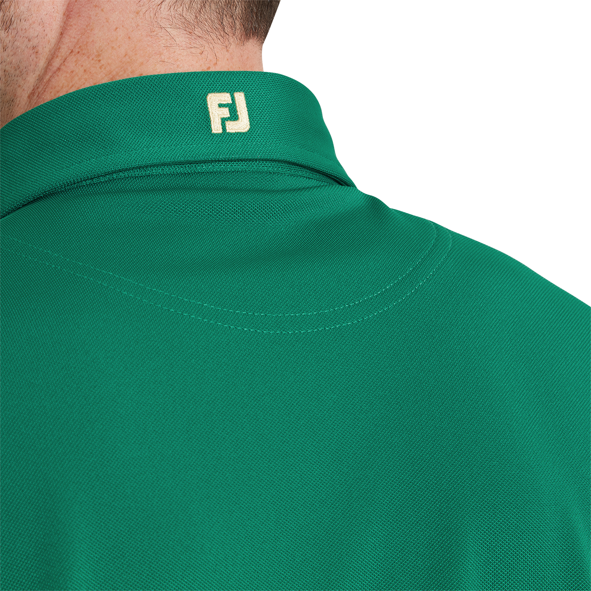 Polo Stretch Piqu&eacute; uni avec logo FJ sur col